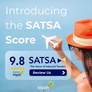 Kiyoh and SATSA in front of a woman holding a plane